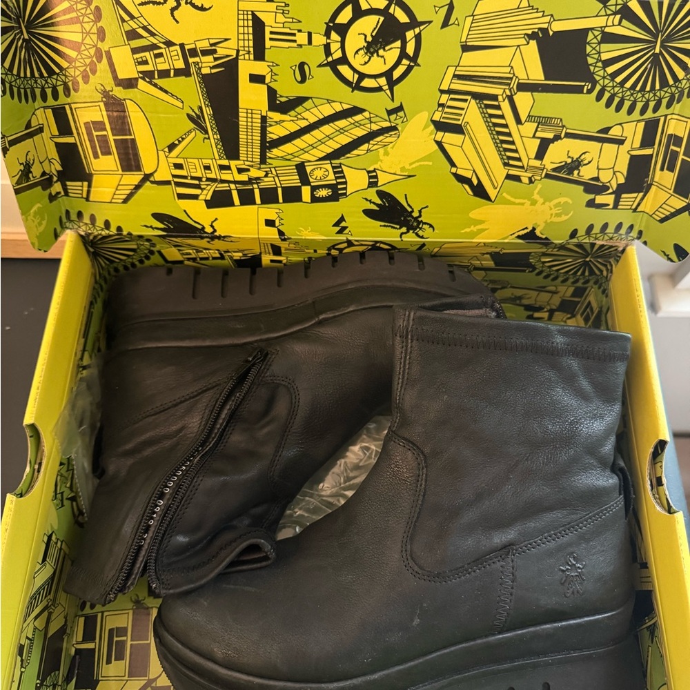 Fly London Black Ankle Boots Sleek and Stylish